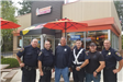 Five officers at Dunkin Donuts for Coffee with Cops