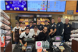 Dunkin'  Donuts Staff with Officers