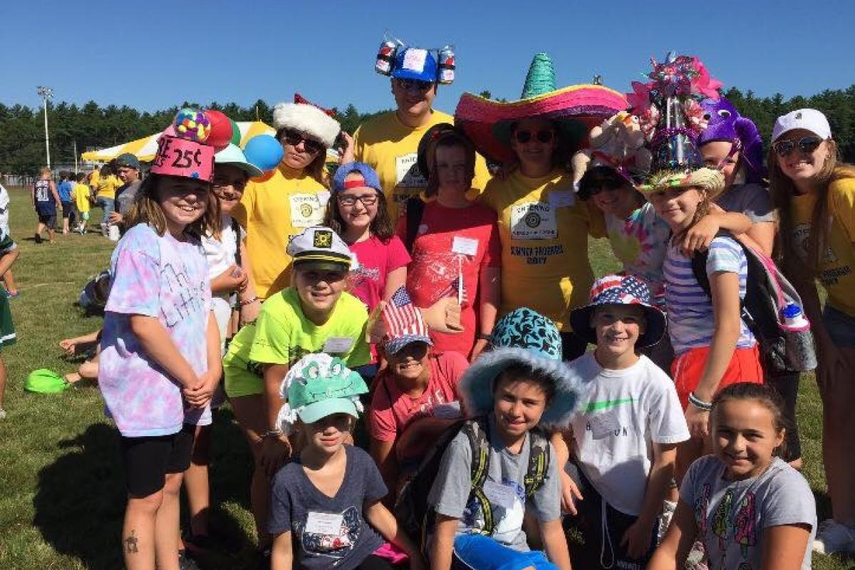 Group of Kids Outside Wearing Funky Hats